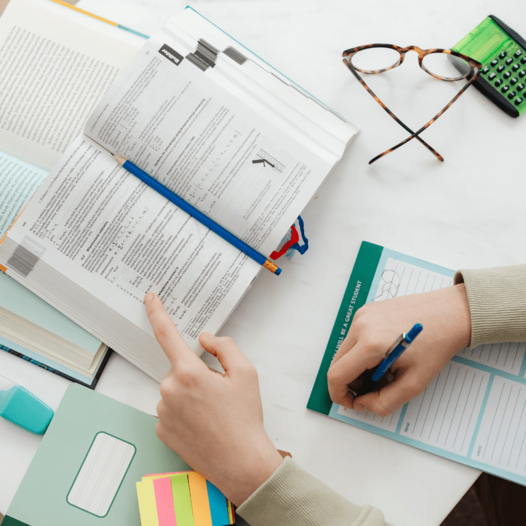 Open budget planning book with notes